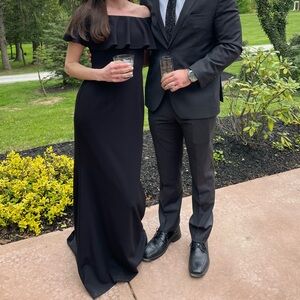 Floor length black gown with small train